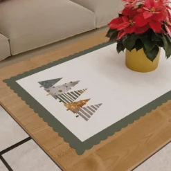 Bieżnik wodoodporny świąteczny 50x100 Pastelowe Choinki